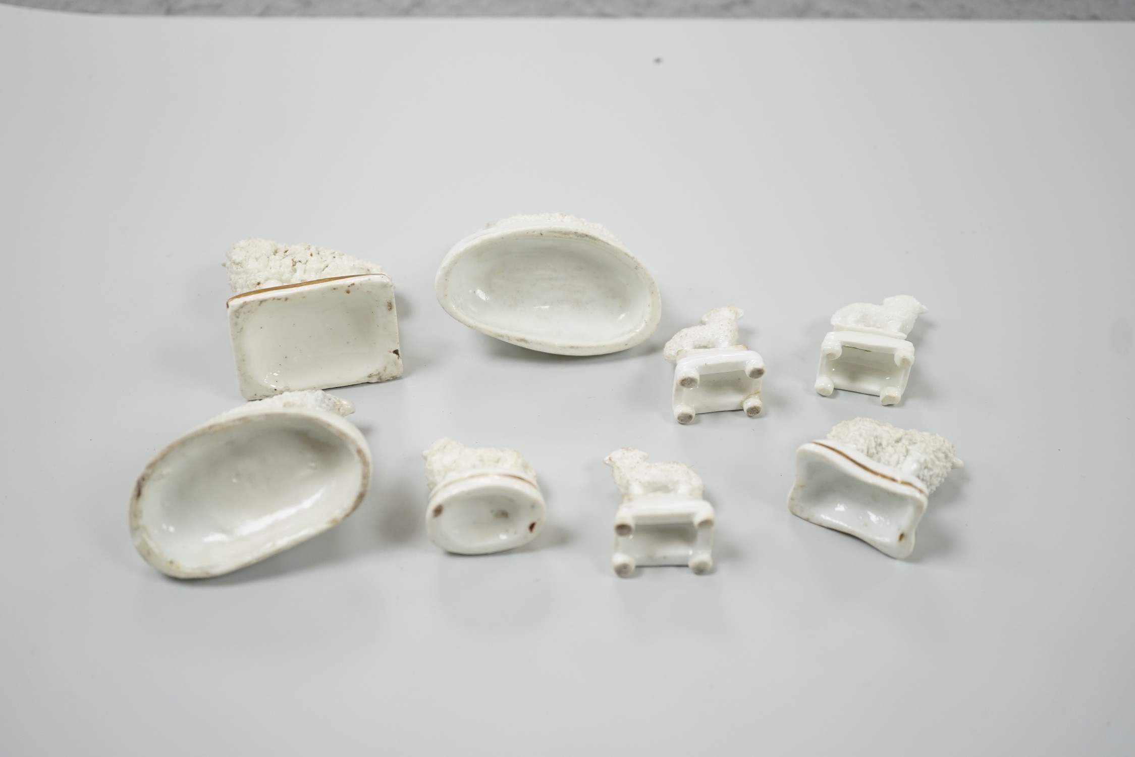 Three small Staffordshire models of sheep, together with five toy Staffordshire models of sheep, c.1830-50 (8). Tallest 5cm, Provenance: Dennis G.Rice collection
